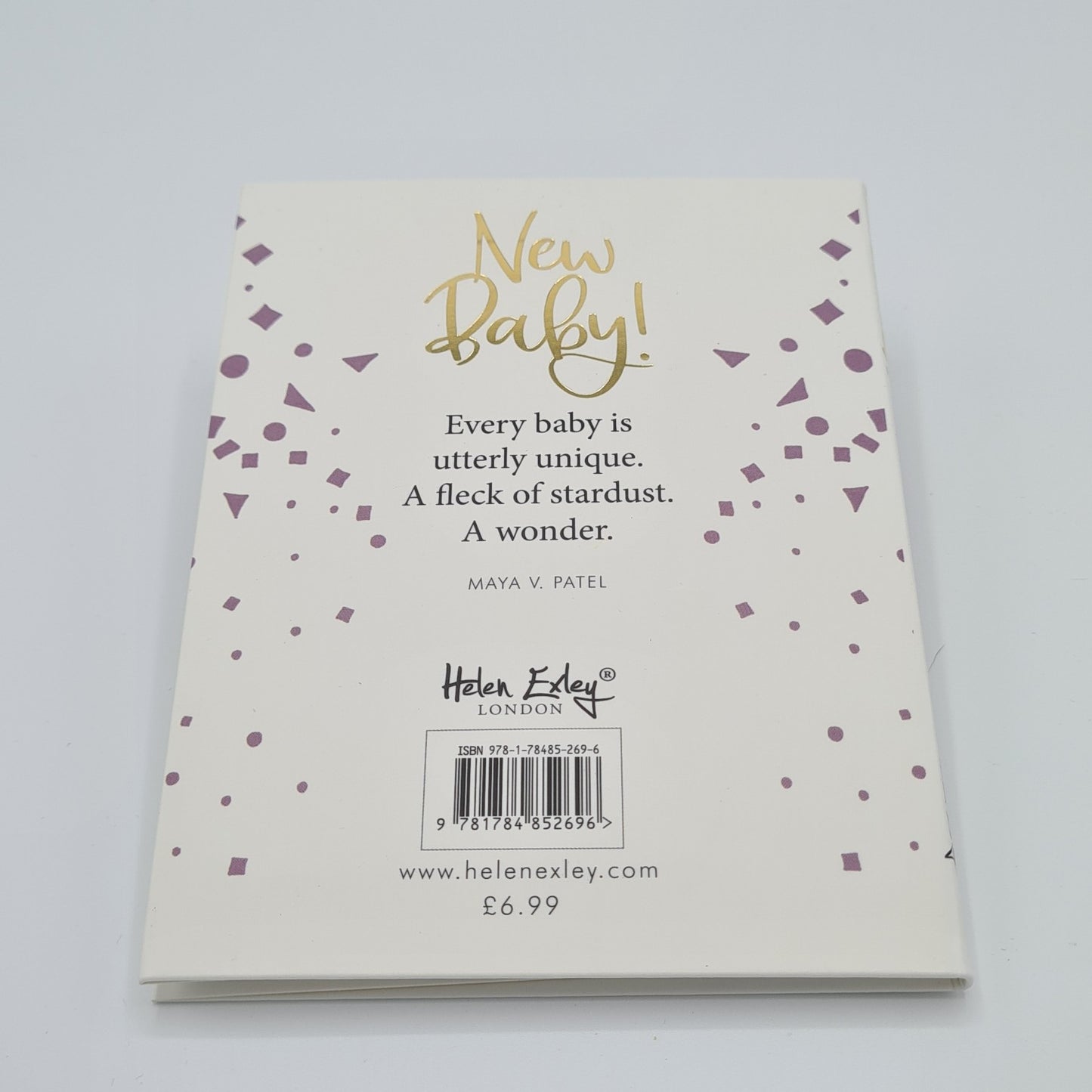 Back cover of little white book with the title "New Baby" written in gold font at the top of the page. There are illustrations of purple squares, triangles and circles down both edges of the page. Half way down the middle of the page, there is a quotation from Maya V Patel written in black text "Every baby is utterly unique. A fleck of stardust. A wonder".