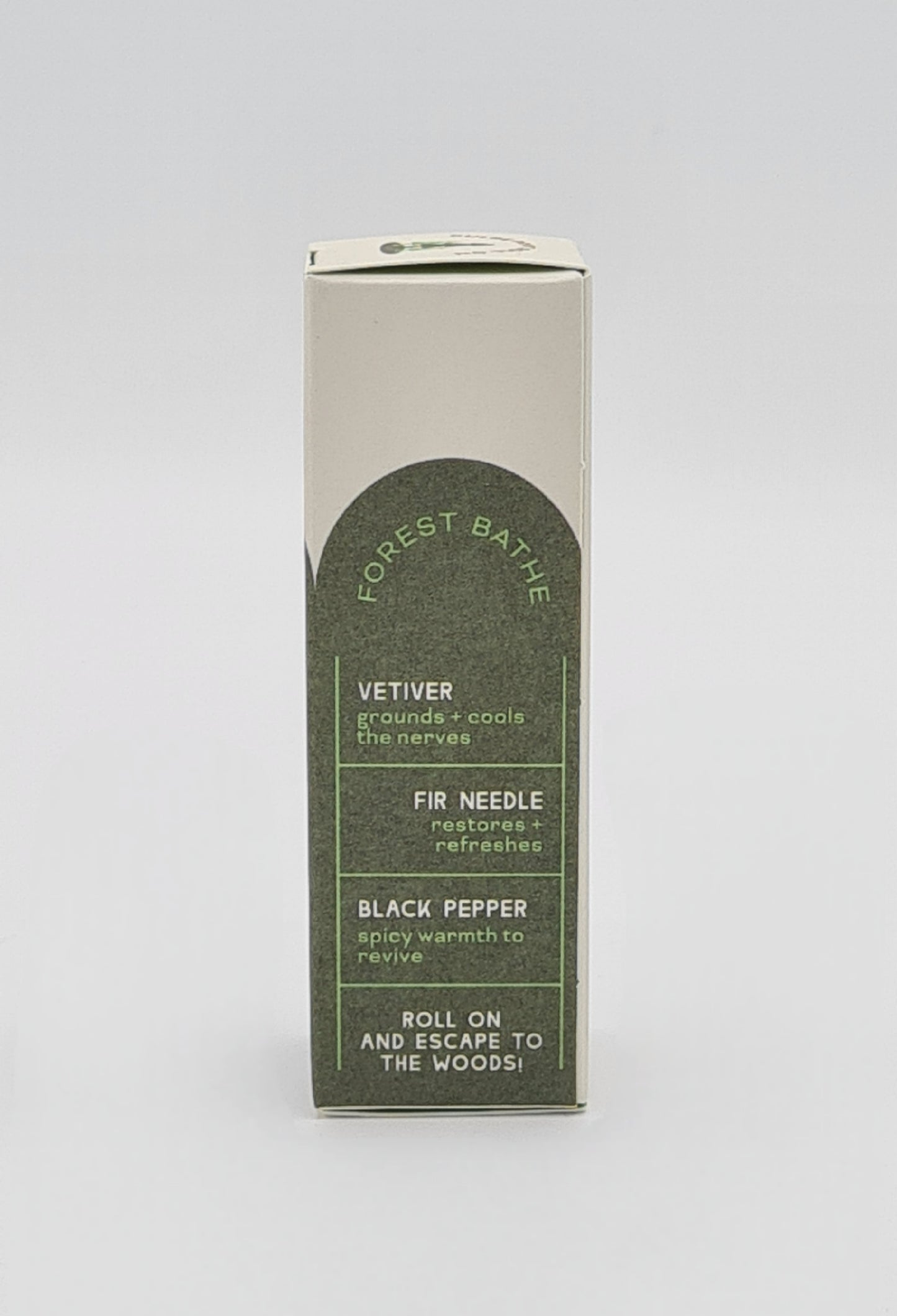 Side view of box for Clarity Blend Deep Forest Pulse Point Roll On detailing ingredients of Vetiver which grounds and cools the nerves, Fir Needle which restores and refreshes and Black Pepper with spicy warmth to revive