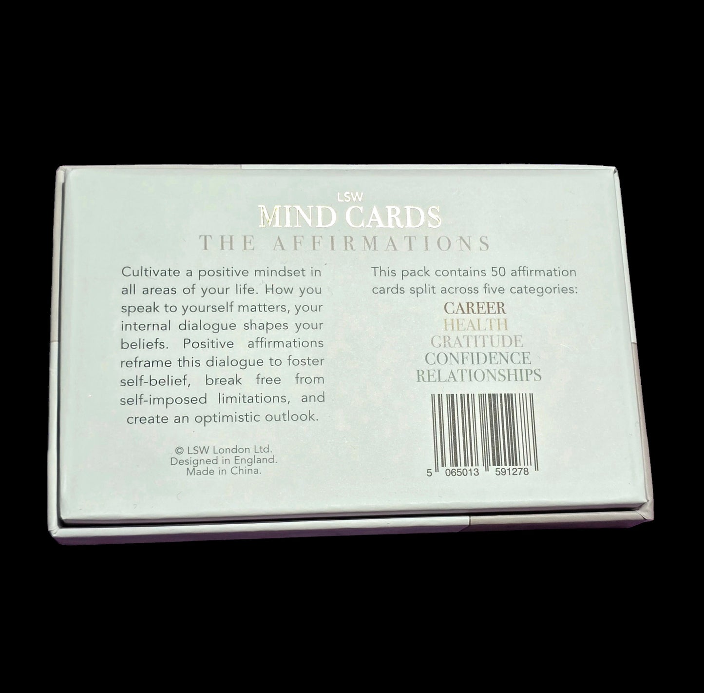 Back of a card box labeled 'MIND CARDS THE AFFIRMATIONS' with text and a barcode.
