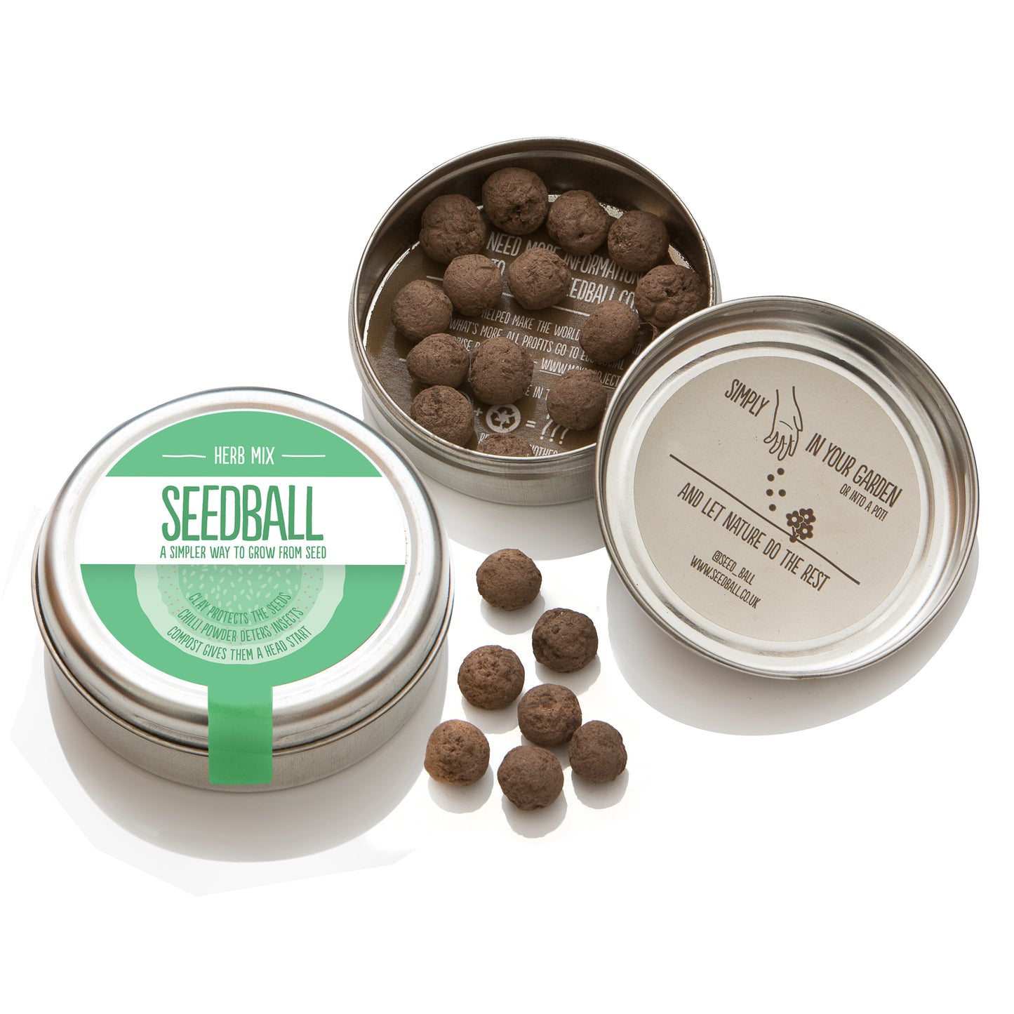 Two silver tins from Seedball. The first tin is closed and has a green label with "Herb Mix" while the other tin is open - in the bottom half of the tin there are 14 visible seedballs whilst the top half of the tin has an inner label stating "Simply scatter (illustrated by a picture of a hand scattering the seeds) in your garden or into a pot and let nature do the rest". There are 6 seedballs placed between the two tins.