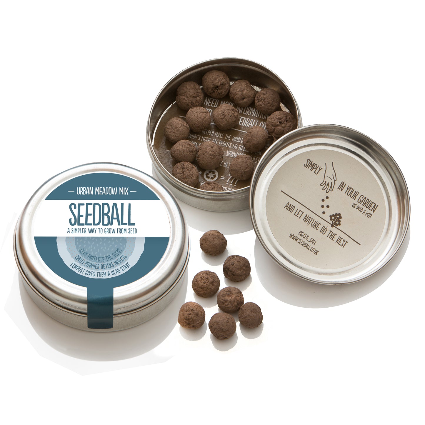 Two silver tins from Seedball. The first tin is closed and has a grey label with "Urban Meadow Mix" while the other tin is open - in the bottom half of the tin there are 14 visible seedballs whilst the top half of the tin has an inner label stating "Simply scatter (illustrated by a picture of a hand scattering the seeds) in your garden or into a pot and let nature do the rest".