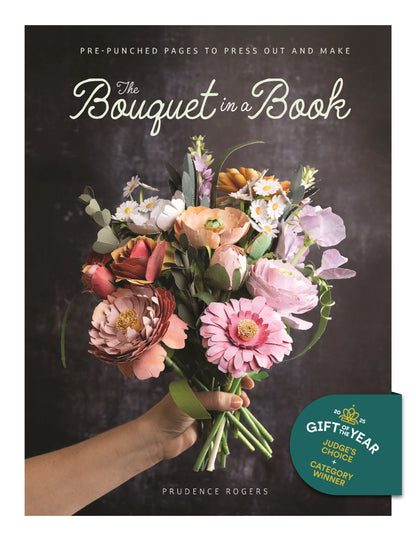 Book cover of 'The Bouquet in a Book' with a bouquet of flowers and a hand holding it.