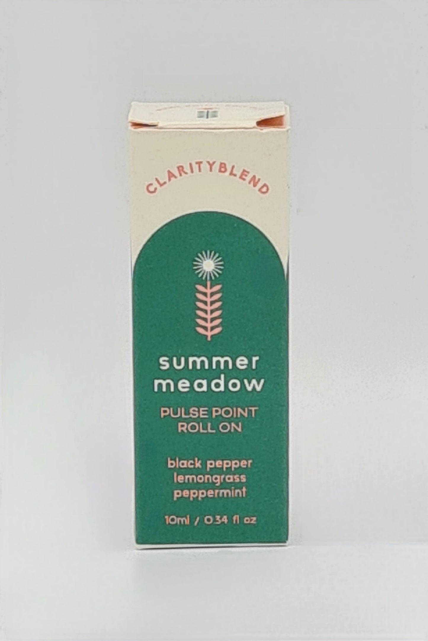 Front of box with green label containing Clarity Blend Summer Meadow Pulse Point Roll On