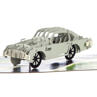 Close up image of pop up card showing an Aston Martin car.