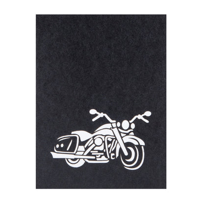 Front of Motorbike pop up card. It is black with a white cut out motorbike.