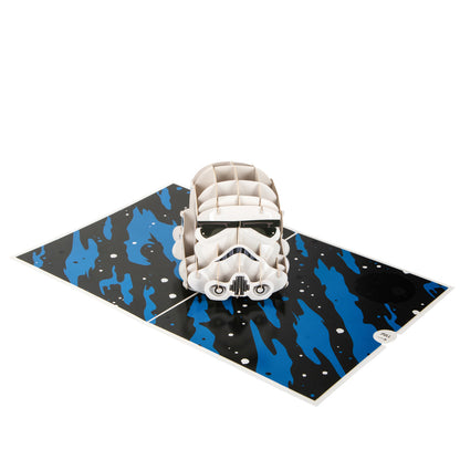 Aerial view of Original Stormtrooper pop up card showing a "popped up" white Stormtrooper Helmet on a space themed background.