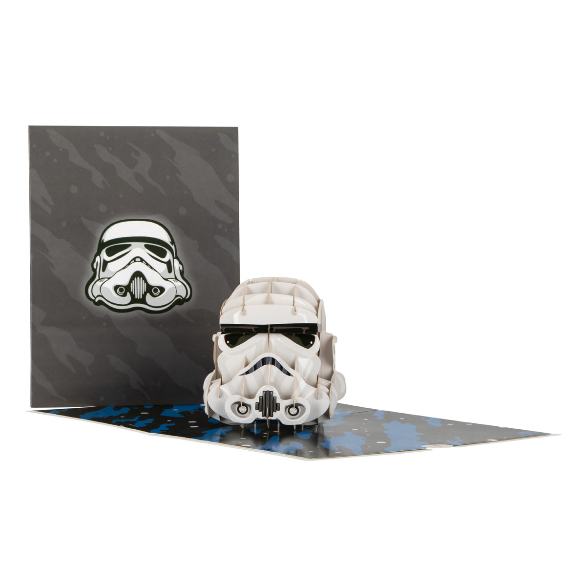 Two images together - the first one on the left shows the front of the card which is dark grey in colour and features an image of a white Stormtrooper Helmet. The second image is of the open card with a "popped up" white Stormtrooper helmet inside. 