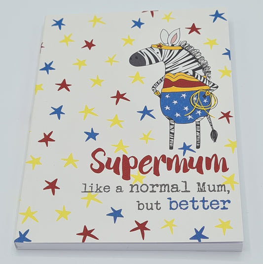 A6 notebook, the cover of which has red, blue and yellow stars and a drawing of a zebra dressed in a Wonder Woman costume. The text below the drawing says "Supermum, like a normal mum but better"