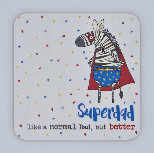 Square coaster with red, yellow and blue stars and a drawing of a zebra dressed as a superhero with red eye mask, blue starry pants and a red cape. Text below states "Superdad, like a normal Dad, but better". 