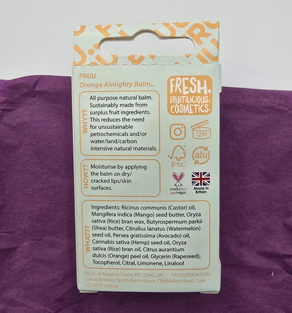 Packaging of Fruu Orange Almighty Balm on a purple background