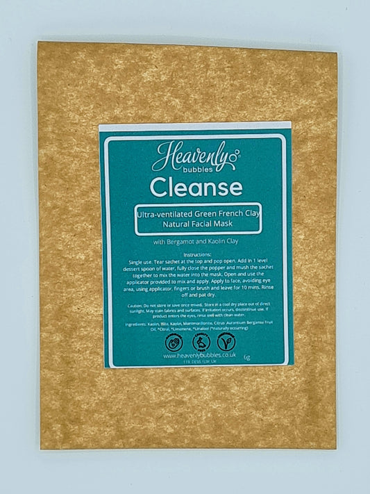 Brown kraft pouch with green label from Heavenly Bubbles stating Cleanse, Ultra-ventilated Green French Clay Natural Facial Mask with Bergamot and Kaolin Clay.