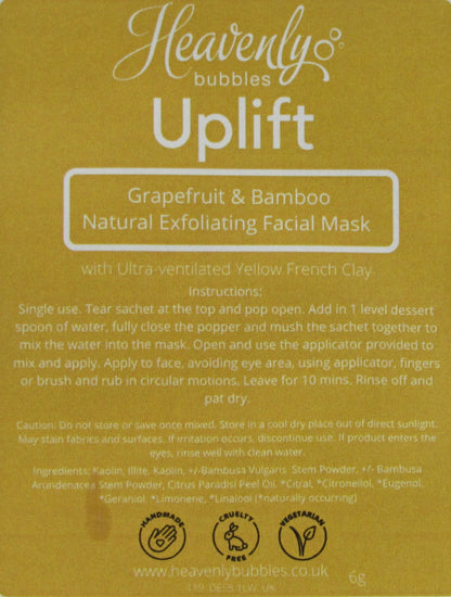 Close up of yellow label from Heavenly Bubbles Uplift Grapefruit & Bamboo Natural Exfoliating Facial Mask with Ultra-Ventilated Yellow French Clay. It shows the instructions for use and list of ingredients. 