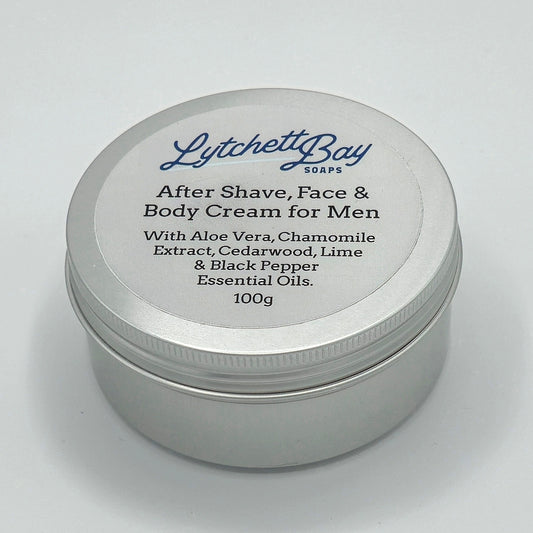 Small round silver tin with a light coloured label saying "Lytchett Bay Soaps After Shave, Face & Body Cream for Men with Aloe Vera, Chamomile Extract, Cedarwood, Lime & Black Pepper Essential Oils". The weight 100g is written at the bottom of the label