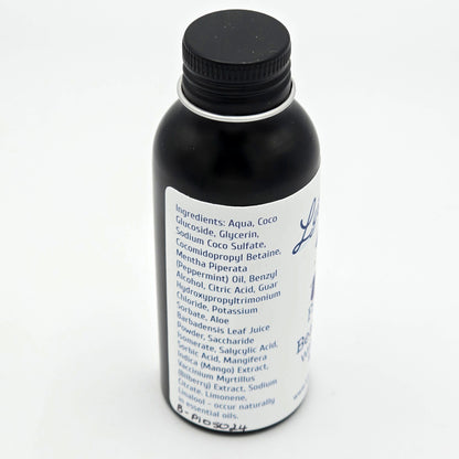 Side view of Fresh Up Beard Wash containing a list of ingredients