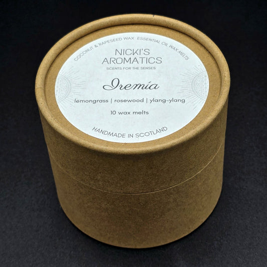 Brown cardboard tube containing wax melts from Nicki's Aromatics. The label says "Iremia - Lemongrass, Rosewood, Ylang-ylang".