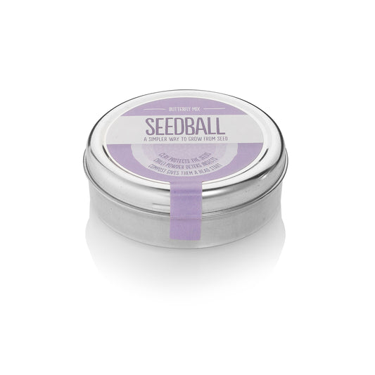 Round silver tin with a lilac label from Seedball, stating "Butterfly Mix". 