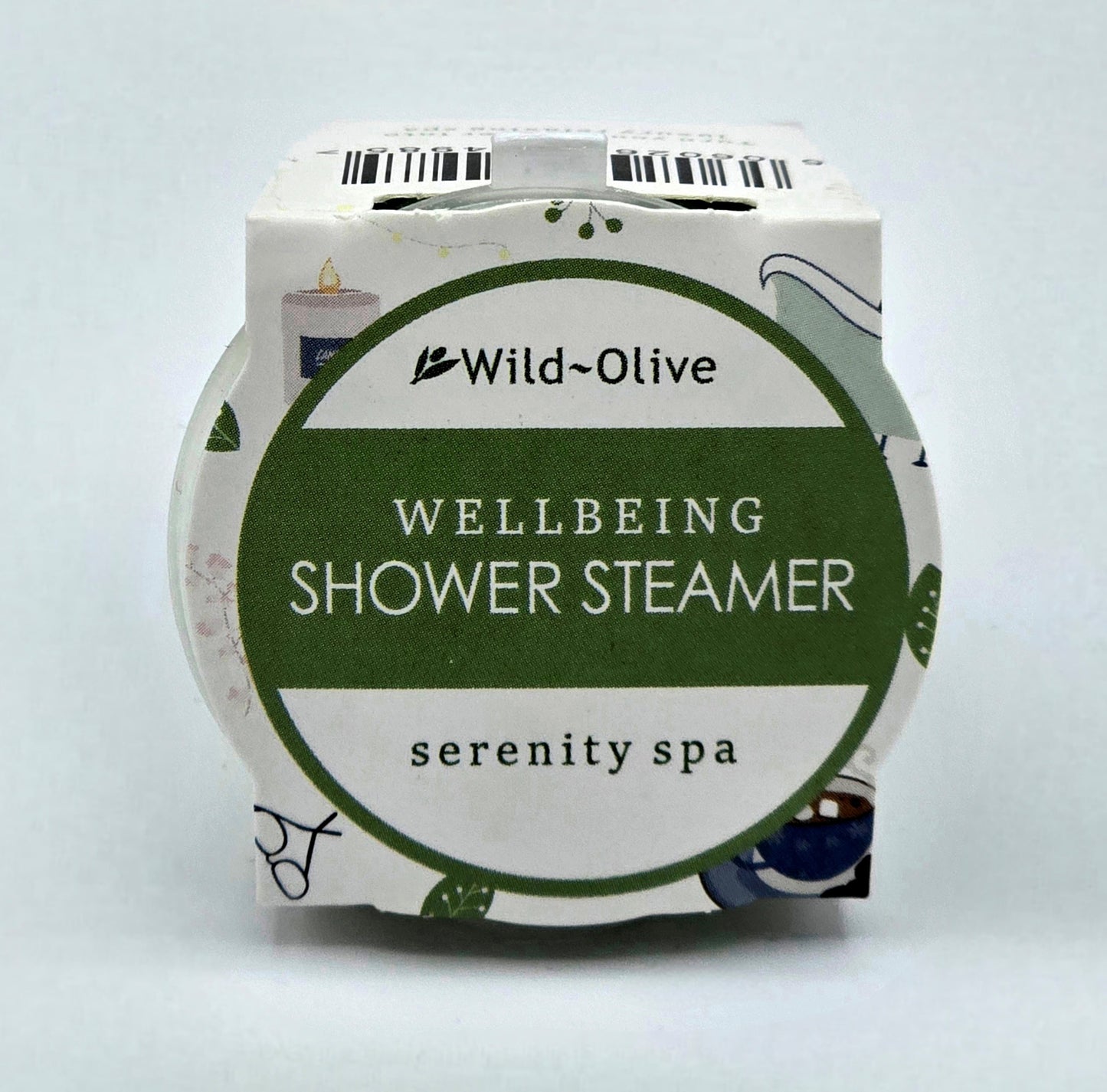 Packaged wellbeing shower steamer with 'Wild Olive' branding on a light gray background