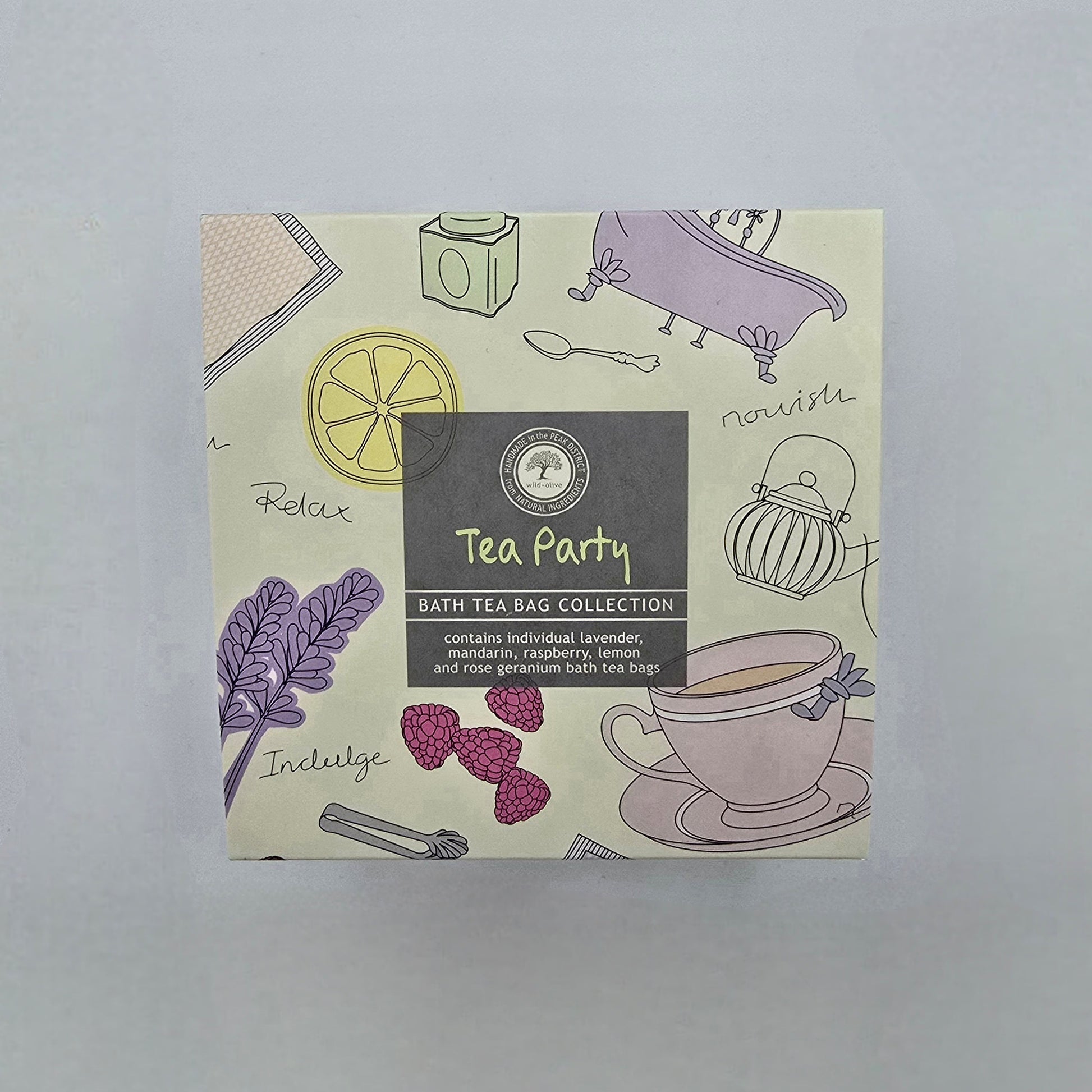 Box of 'Tea Party' bath tea bag collection with illustrations on a light gray background